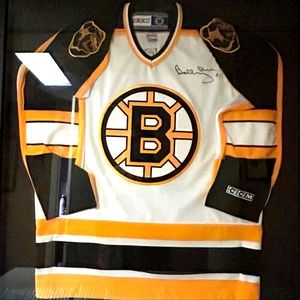 Signed and authenticated Bobby Orr Jersey in frame